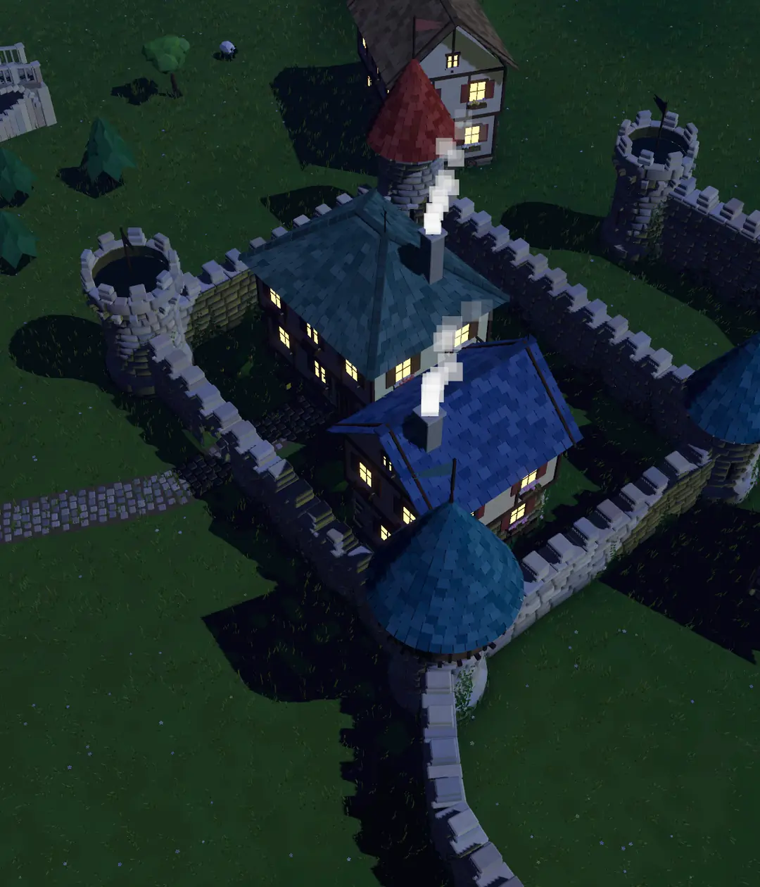 The same village at night, with glowing windows